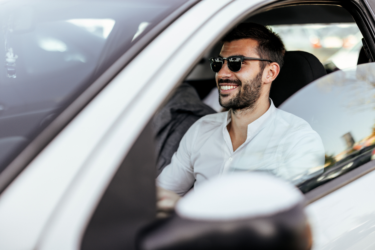 https://abundancefinance.com.au/wp-content/uploads/sites/62/2024/07/happy-man-in-car.jpg